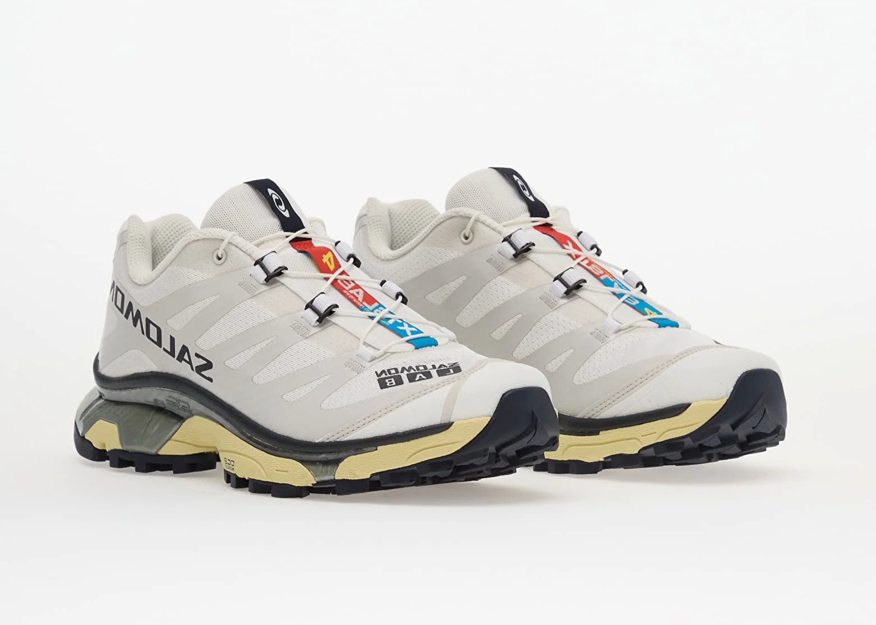 Sneakers Salomon XT-4 blanches Lunar Rock et Night Sky en mesh technique avec Agile Chassis System et semelle Contagrip