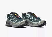 Sneaker Salomon XT-6 Bistro Green Milieu en mesh vert foncé avec détails naturels, système Quicklace, amorti EnergyCell et semelle Contagrip.