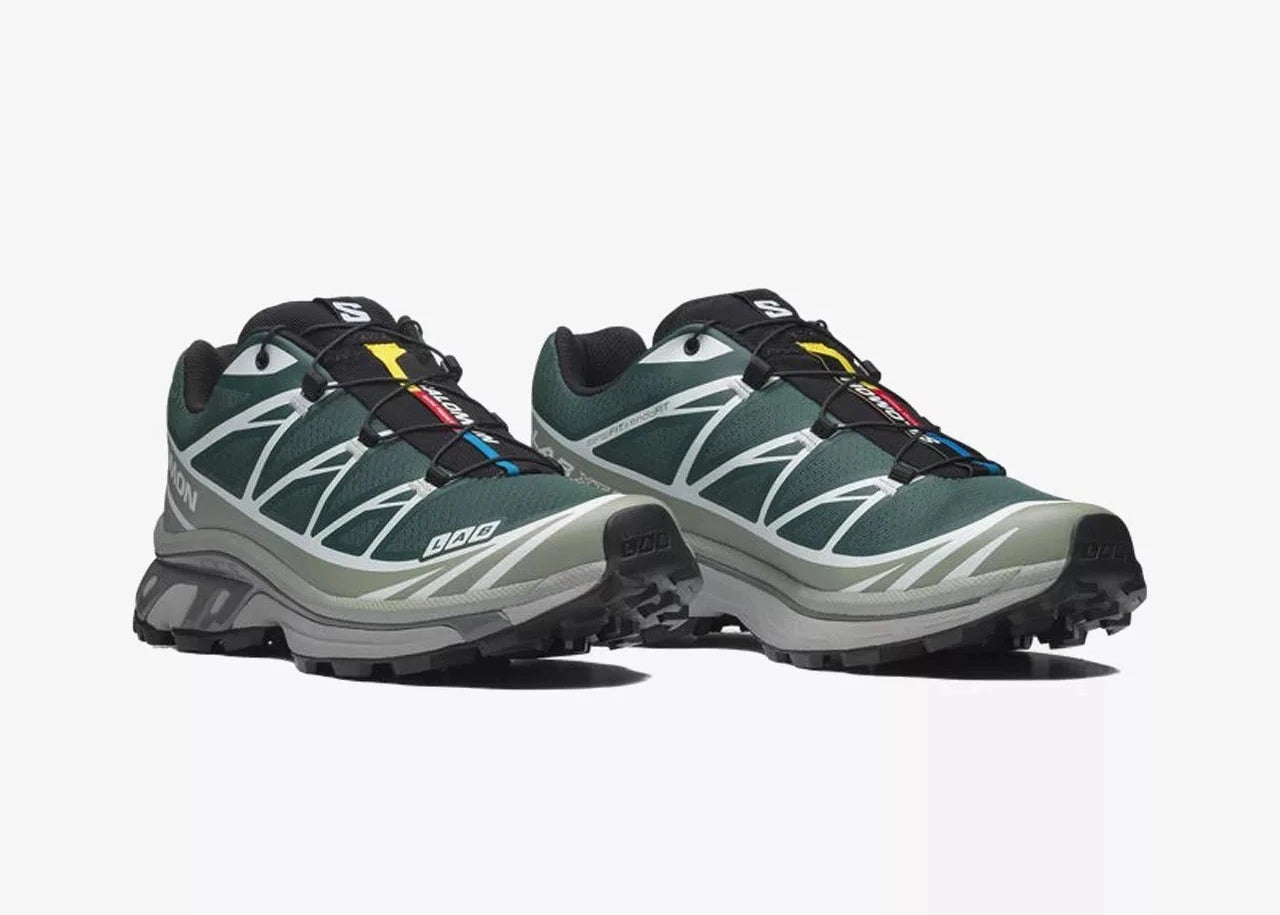 Sneaker Salomon XT-6 Bistro Green Milieu en mesh vert foncé avec détails naturels, système Quicklace, amorti EnergyCell et semelle Contagrip.