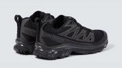 Sneaker Salomon XT-6 Expanse Black en mesh technique avec renforts synthétiques, semelle Contagrip® et laçage Quicklace™.