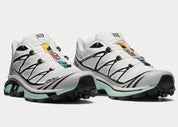 Sneaker Salomon XT-6 White Icy Morn en mesh blanc avec détails bleu glacier, système Quicklace, amorti EnergyCell et semelle Contagrip.