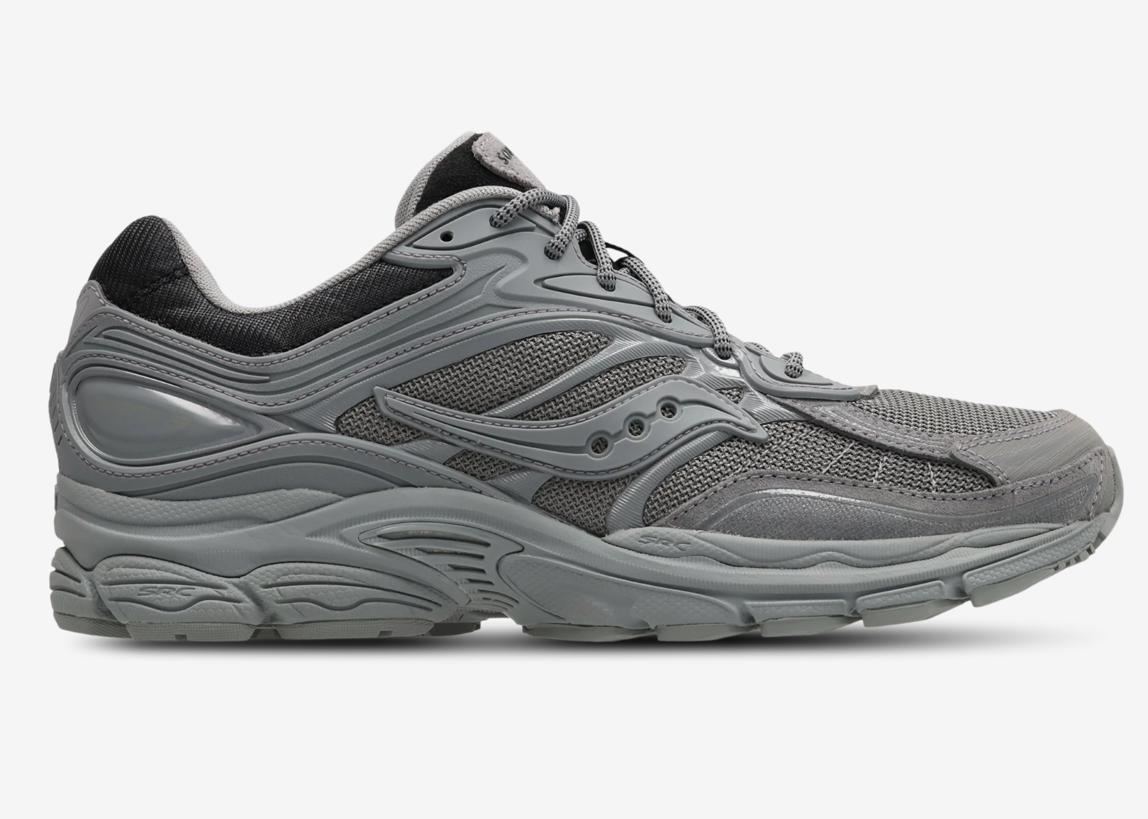 Saucony ProGrid Omni 9 Armor Grey, sneaker running rétro grise en mesh avec renforts synthétiques ton sur ton et semelle épaisse vue de profil 