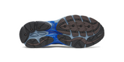 Saucony ProGrid Omni 9 Disrupt Black Torte, sneaker Saucony noire aux nuances Torte avec design running rétro, empeigne multicouche et semelle volumineuse vue de dessous. 