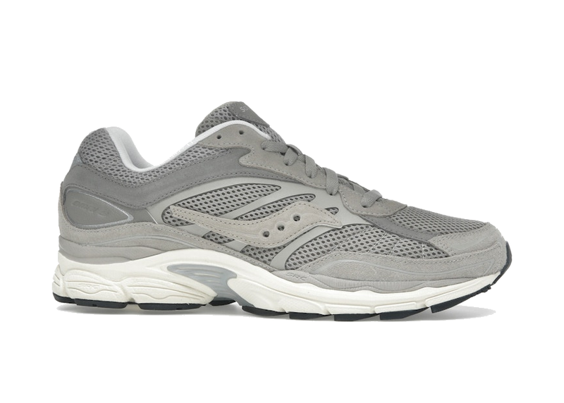 Saucony ProGrid Omni 9 Premium Grey, sneaker running rétro grise en mesh respirant avec empiècements en suède et cuir et semelle ProGrid vue de profil. 