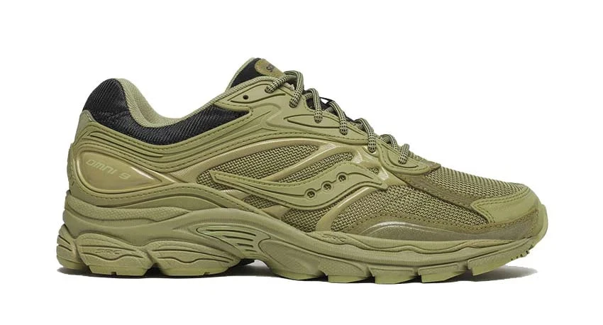Saucony ProGrid Omni 9 Armor Green en mesh respirant avec renforts synthétiques et amorti ProGrid vue de profil. 