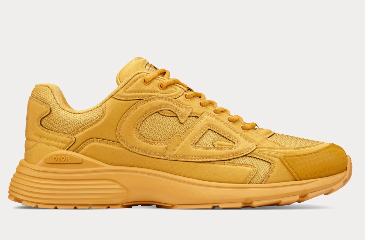 Dior x Stone Island B30 Sneaker Yellow avec tige en mesh respirant, empiècements en cuir et matières techniques jaunes, silhouette running moderne et semelle en caoutchouc.