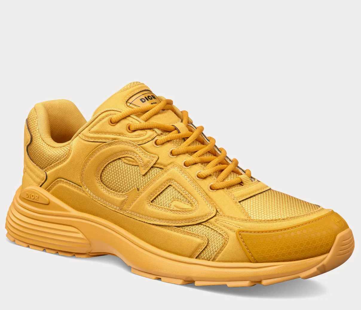 Dior x Stone Island B30 Sneaker Yellow avec tige en mesh respirant, empiècements en cuir et matières techniques jaunes, silhouette running moderne et semelle en caoutchouc.