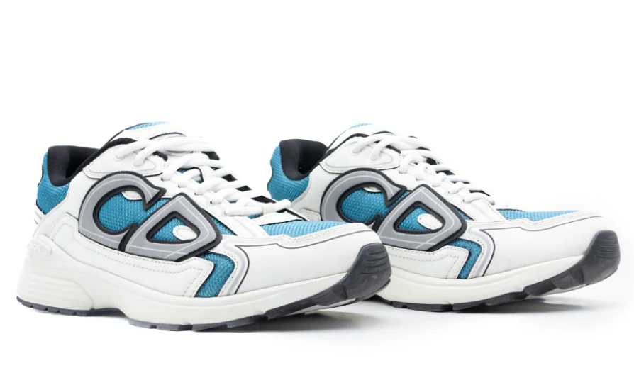 Dior B30 Blue Mesh White Technical Fabric avec tige en mesh bleu respirant, empiècements en tissu technique blanc, silhouette running moderne et semelle en caoutchouc.