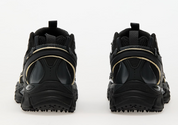 OFF-WHITE Be Right Back Black avec tige en mesh respirant, empiècements en cuir, daim et matières synthétiques noires, silhouette running moderne et semelle en caoutchouc.