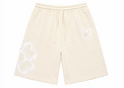 Short Torom Beige Sable, short Torom beige sable à la coupe confortable et décontractée, idéal pour une silhouette streetwear estivale.