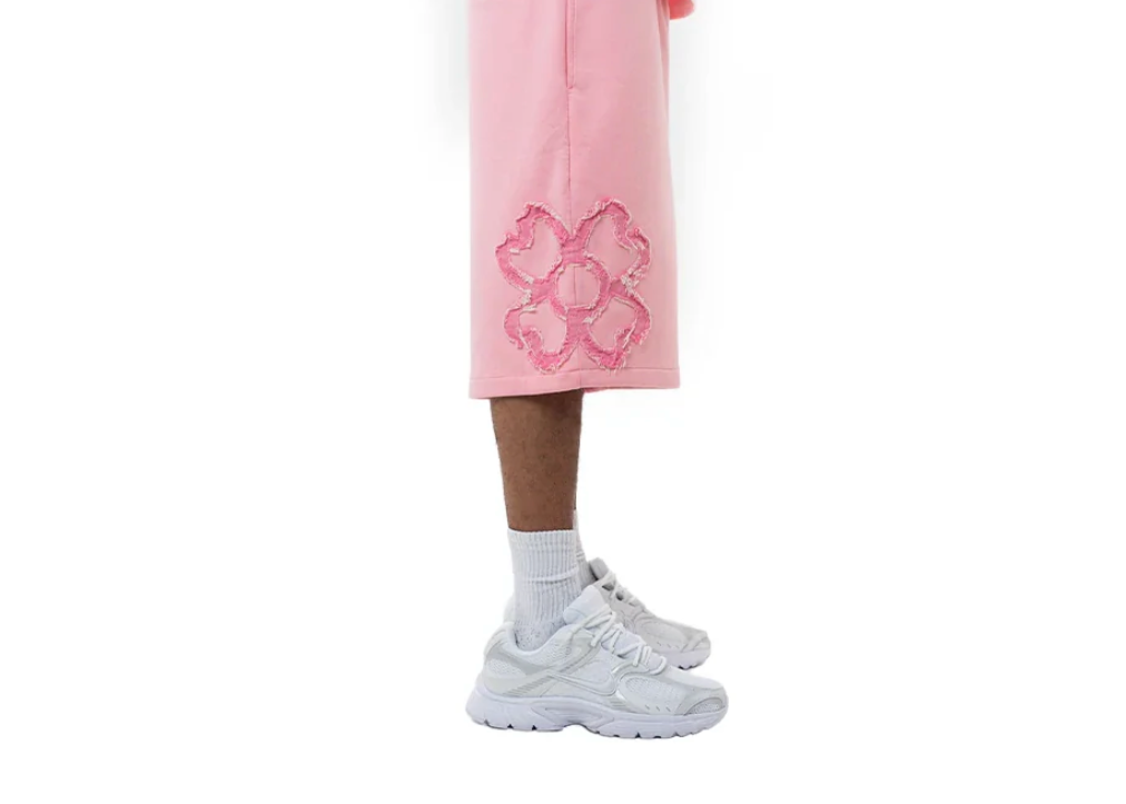 Short Torom Rose, short Torom rose à la coupe confortable et décontractée, idéal pour une tenue streetwear estivale.