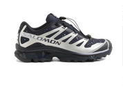 Sneakers Salomon XT-4 OG Gore-Tex atmos Stars Collide II en mesh technique imperméable avec détails cosmiques, semelle Contagrip et laçage Quicklace.