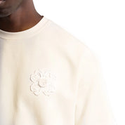 T-shirt Torom Beige Sable, tee-shirt Torom beige sable à manches courtes et col rond au style streetwear minimaliste.