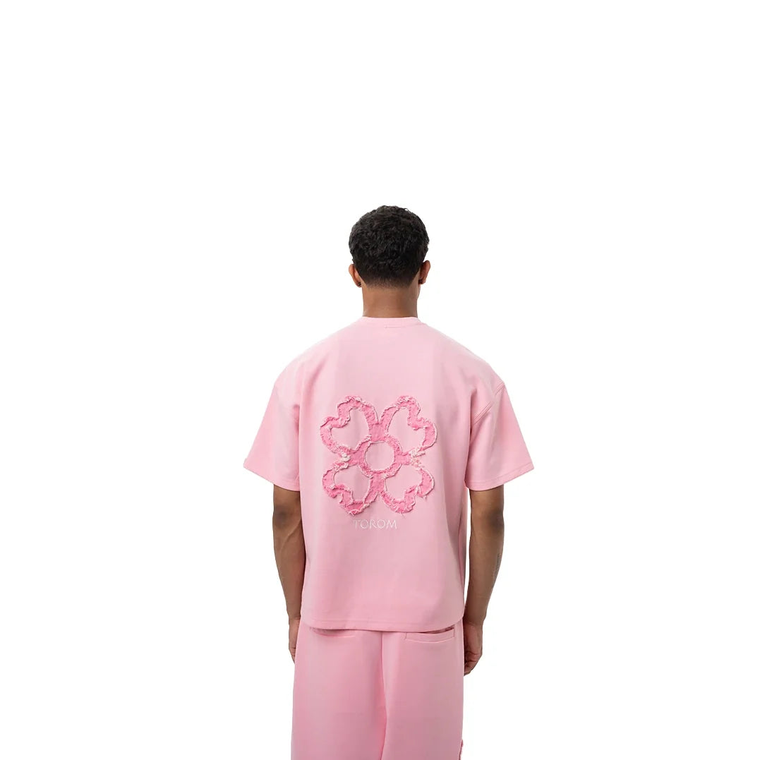 T-shirt Torom Rose, tee-shirt Torom rose à manches courtes et col rond au style streetwear contemporain.