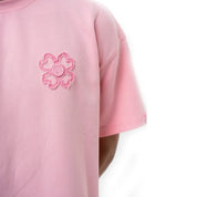 T-shirt Torom Rose, tee-shirt Torom rose à manches courtes et col rond au style streetwear contemporain.