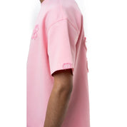 T-shirt Torom Rose, tee-shirt Torom rose à manches courtes et col rond au style streetwear contemporain.