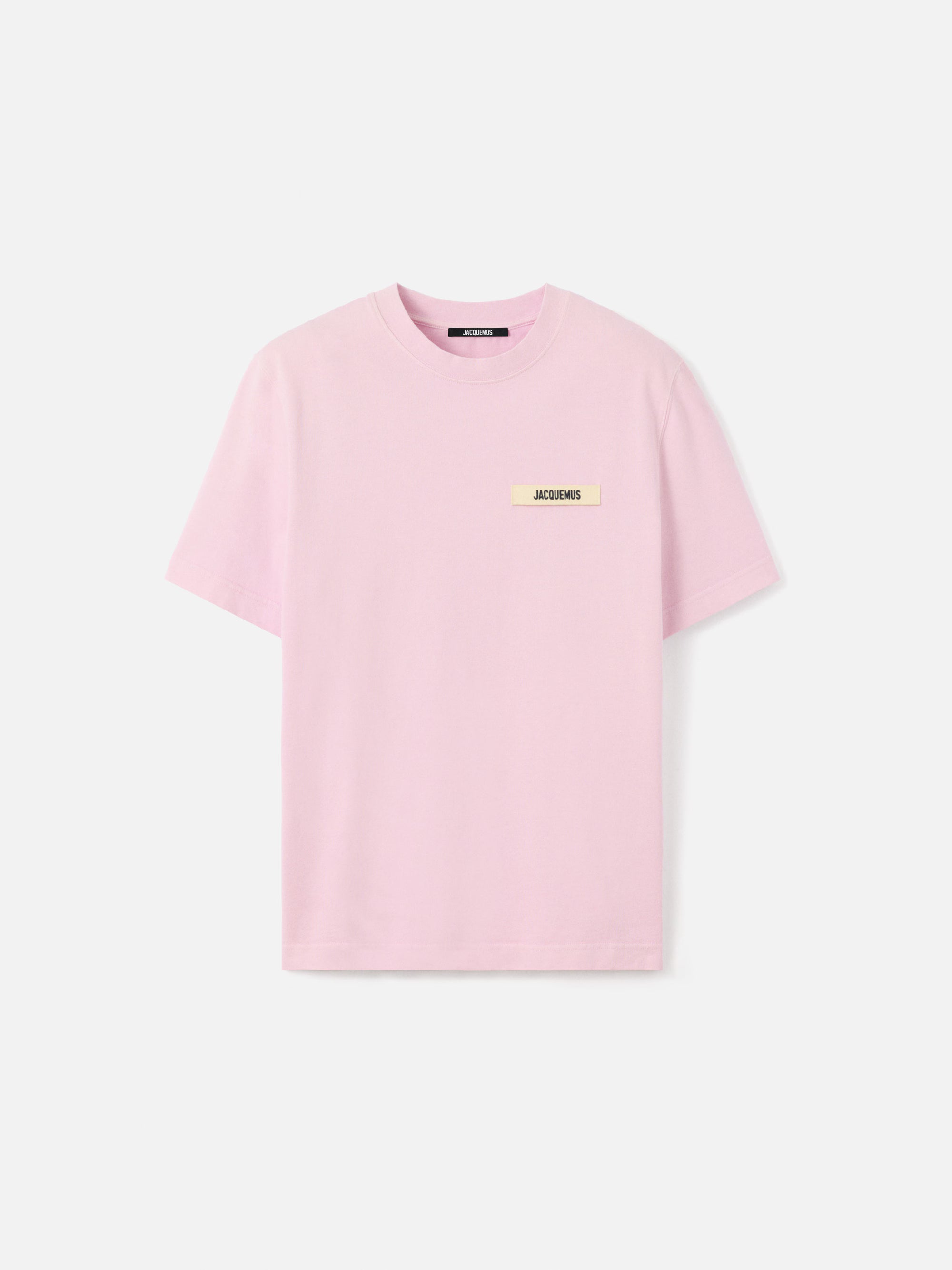 Tee-shirt JACQUEMUS Gros Grain rose clair en coton premium, avec col rond côtelé, détail Gros Grain signature et coupe régulière au style minimaliste.
