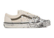Vans Premium Old Skool 36 Paint Splatter Turtledove beige en suède et toile avec éclaboussures de peinture multicolores et semelle gaufrée classique.