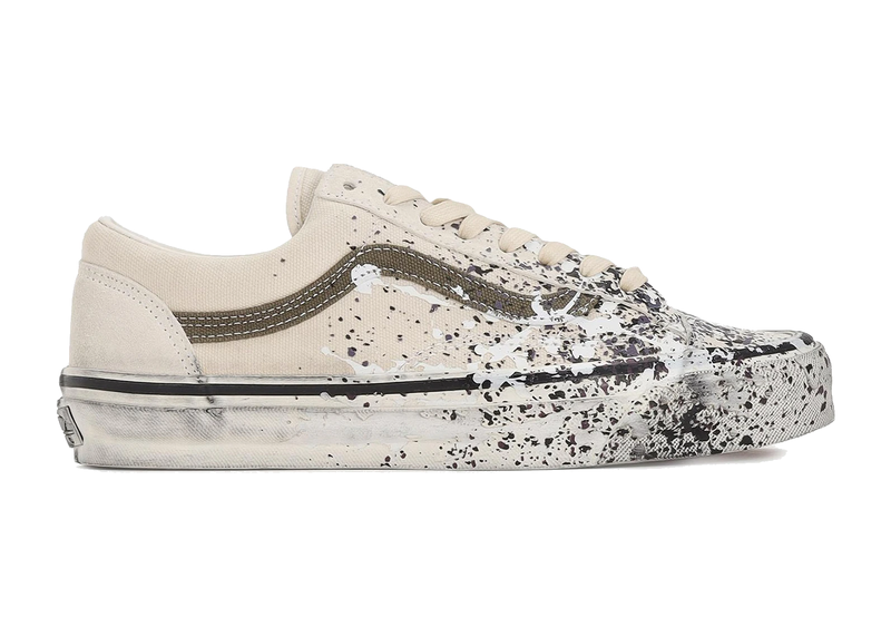 Vans Premium Old Skool 36 Paint Splatter Turtledove beige en suède et toile avec éclaboussures de peinture multicolores et semelle gaufrée classique.