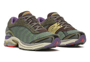 Saucony ProGrid Paramount A-Feeling Science of Wow avec tige en mesh respirant, empiècements synthétiques et TPU, technologie ProGrid et semelle extérieure en caoutchouc.