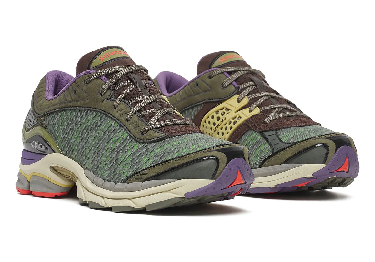 Saucony ProGrid Paramount A-Feeling Science of Wow avec tige en mesh respirant, empiècements synthétiques et TPU, technologie ProGrid et semelle extérieure en caoutchouc.