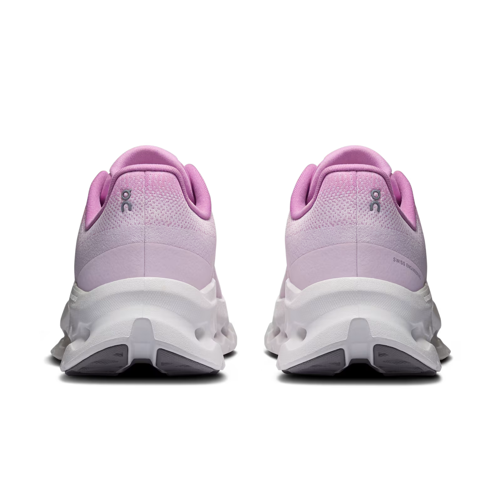 On Running Cloudtilt Bloom Sakura, sneaker lifestyle rose On Running équipée de la technologie CloudTec Phase® et de l'amorti Helion™ vue de derrière. 