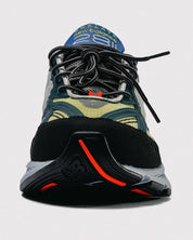 New Balance 2811 Action Bronson Baklava Mikročpske, sneakers issues de la collaboration avec Action Bronson, dotées d'une tige en matériaux premium et d'un design exclusif.
