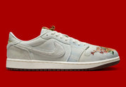 Sneakers Air Jordan 1 Retro Low OG en cuir premium avec détails brodés inspirés du Nouvel An chinois, coloris rouge et accents dorés, édition collector 2026.

