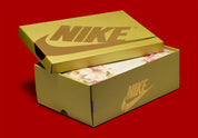 Sneakers Air Jordan 1 Retro Low OG en cuir premium avec détails brodés inspirés du Nouvel An chinois, coloris rouge et accents dorés, édition collector 2026.

