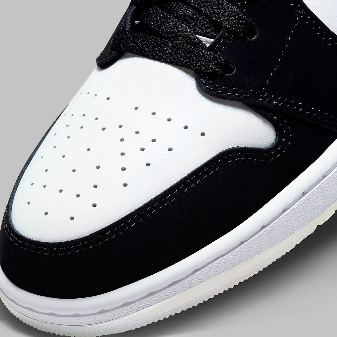 Air Jordan 1 Mid Diamond Shorts, sneaker mi-montante Jordan Brand inspirée des Diamond Shorts avec design emblématique et finitions premium.