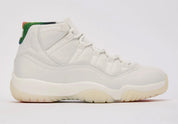 Sneakers Air Jordan 11 Retro 285 en cuir verni et mesh technique avec semelle translucide et amorti Air iconique vue de profil. 