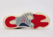 Sneakers Air Jordan 11 Retro 285 en mesh balistique et cuir verni avec semelle translucide et amorti Air iconique.Vue semelle extérieur 