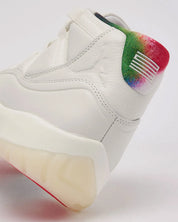 Sneakers Air Jordan 11 Retro 285 en mesh balistique et cuir verni avec semelle translucide et amorti Air iconique.Vue zoomer arrière 