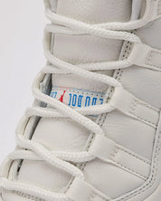 Sneakers Air Jordan 11 Retro 285 en mesh balistique et cuir verni avec semelle translucide et amorti Air iconique.Vue zoomer avant 