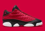 Air Jordan 13 Retro Low Very Berry (TD) en coloris Black/Very Berry-White, avec base noire et détails Very Berry.
