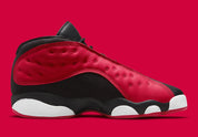 Air Jordan 13 Retro Low Very Berry (TD) en coloris Black/Very Berry-White, avec base noire et détails Very Berry.