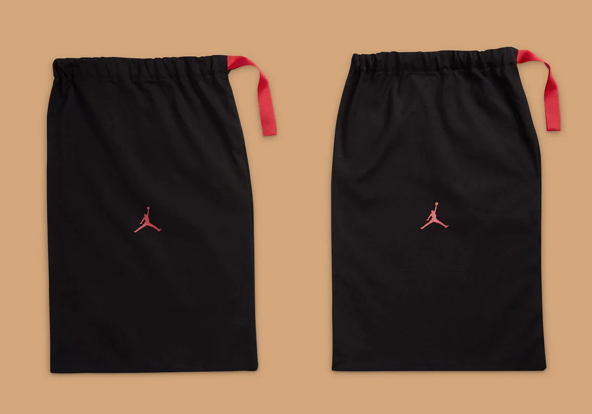Air Jordan 3 Retro PRM Bin23 en cuir premium brun avec sceau rouge Bin23 et amorti Air visible emblématique.
