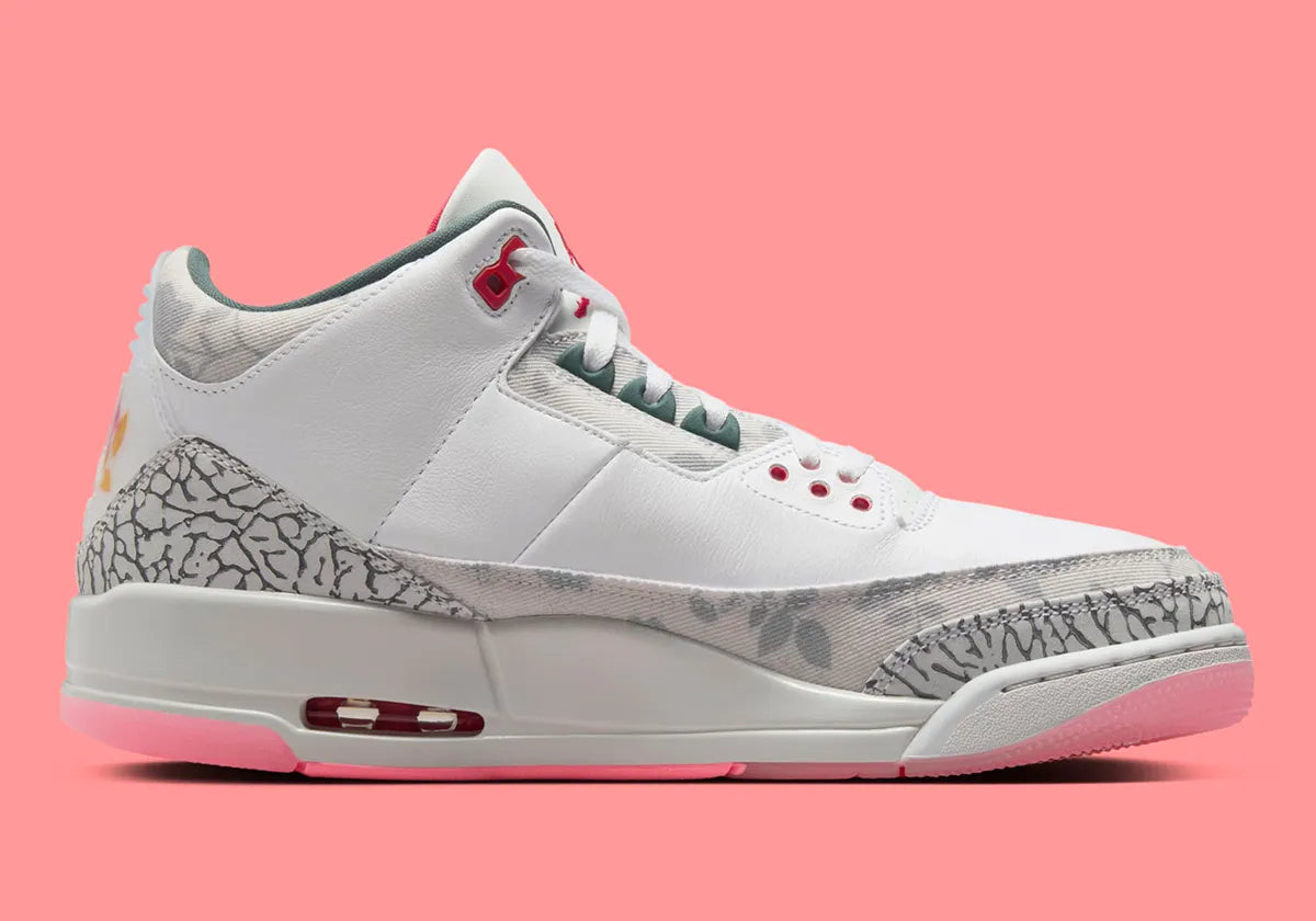 Air Jordan 3 Retro Wings HM6993-100 blanche avec Elephant Print crème, détails Vintage Green et Rose, motif floral et unité Air visible.