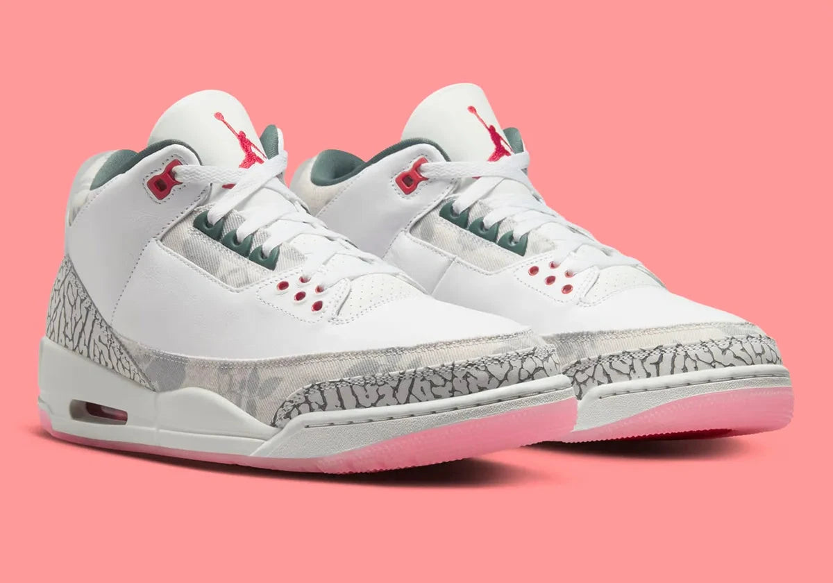 Air Jordan 3 Retro Wings HM6993-100 blanche avec Elephant Print crème, détails Vintage Green et Rose, motif floral et unité Air visible.