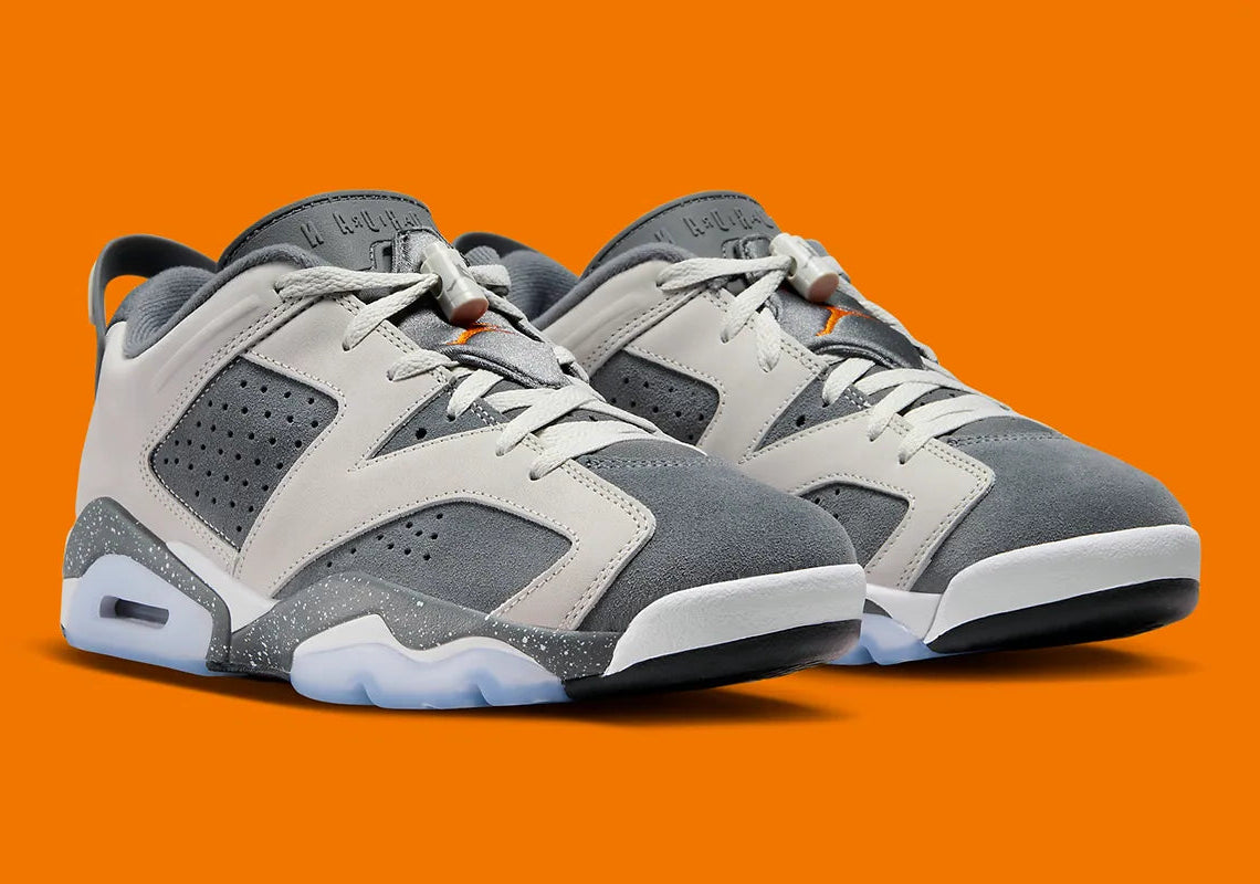 Air Jordan 6 Retro Low PSG 2023 DZ4133-008 en Light Bone et Iron Grey avec accents Magma Orange, semelle mouchetée et outsole translucide.