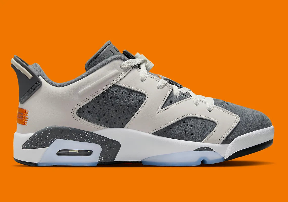Air Jordan 6 Retro Low PSG 2023 DZ4133-008 en Light Bone et Iron Grey avec accents Magma Orange, semelle mouchetée et outsole translucide.