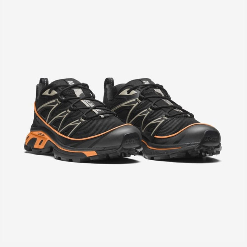 Salomon XT-6 Expanse Black Papaya avec tige en mesh noir, empiècements synthétiques, détails Papaya, technologies Quicklace, SensiFit, EnergyCell et semelle Contagrip.