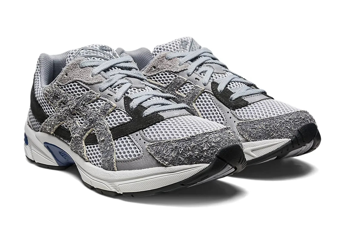 ASICS Gel-1130 Mid Grey Steel Grey – sneakers modernes et confortables inspirées du rétro-running, bleu, gris, noir, vue de face 3/4