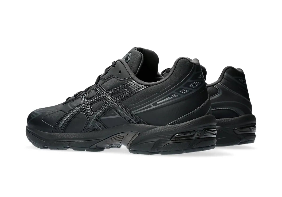 Chaussure de running ASICS GEL 1130 FULL BLACK, noir, semelle légère, vue de coté