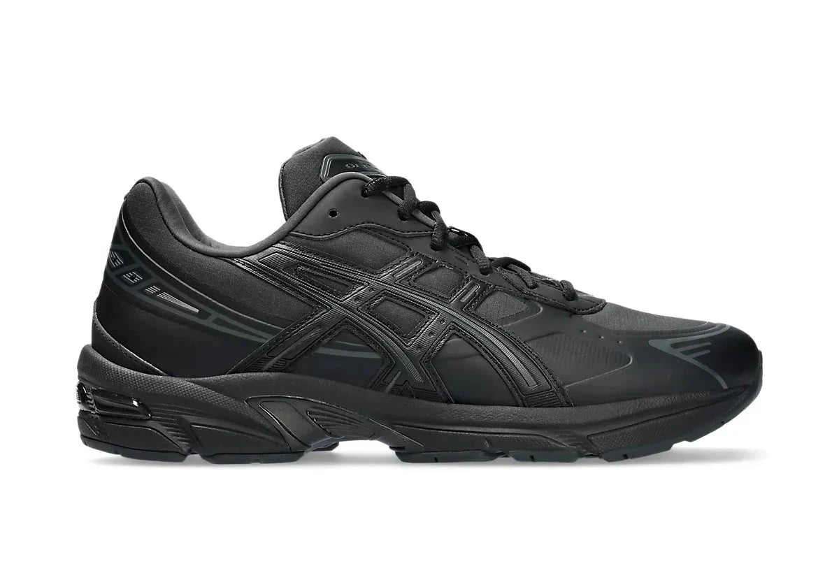 Chaussure de running ASICS GEL 1130 FULL BLACK, noir, semelle légère, vue de profil