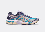 Sneaker ASICS Gel-Cumulus 16 Purple Cloud Grey Bisque en mesh gris avec détails violets et beige crème, amorti GEL et design rétro-running inspiré des années 2010.