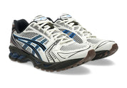 Sneakers ASICS Gel-Kayano 14 Cream et Blue Coast en mesh respirant avec amorti GEL® et semelle FF Blast+ premium.Vue de coté 