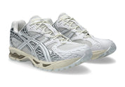 Image de la ASICS Gel-Nimbus 10.1 White Pure Silver, sneaker running en mesh blanc et cuir synthétique argenté, avec technologie GEL™ amortissante, semelle épaisse EVA et design rétro 2000s