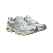 Image de la ASICS GT-2160 Miami Dolphins, sneaker en mesh blanc avec superpositions argentées, accents turquoise et orange, et semelle dotée de la technologie GEL™. (vue de 3/4)