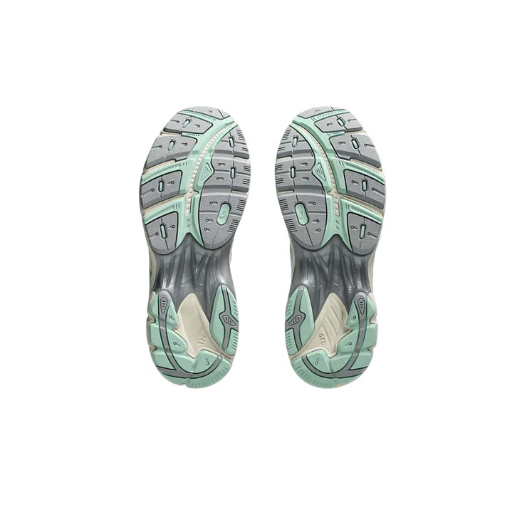 Image de la ASICS GT-2160 Miami Dolphins, sneaker en mesh blanc avec superpositions argentées, accents turquoise et orange, et semelle dotée de la technologie GEL™. (vue semelle)